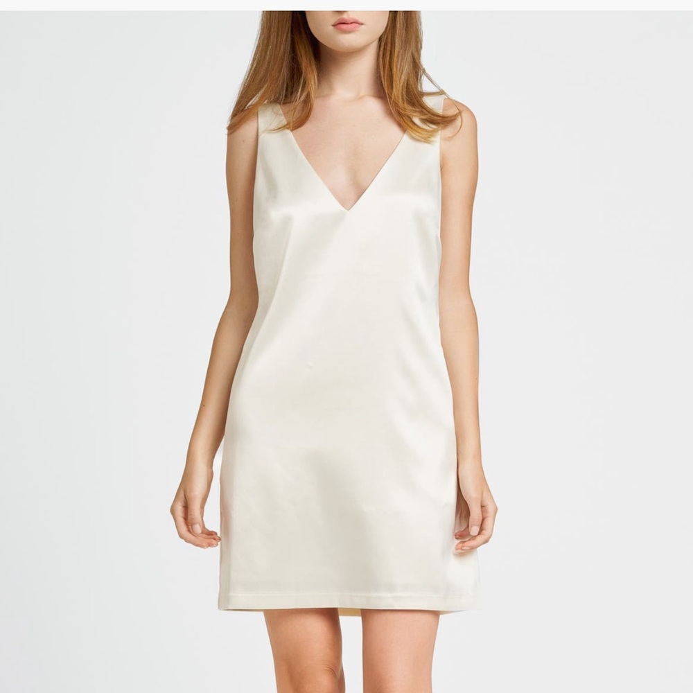 Elegant Cream Sleeveless Dress